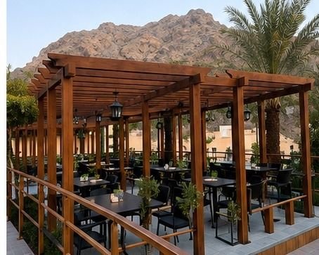 Custom pergola with outdoor seating fabricated by MRFT in Oman